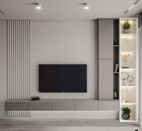 Customized TV panel and furniture in a modern UAE apartment